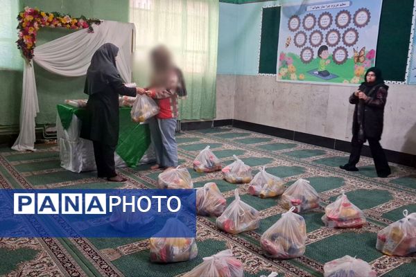توزیع بسته‌های معیشتی در مدرسه عمار نصیرشهر