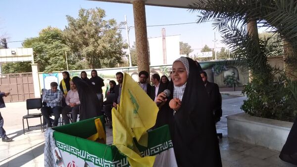 نواخته شدن زنگ نمادین  مشق همدلی در دبیرستان دخترانه بهارآزادی و پسرانه شاهد فاضل فلاورجان 