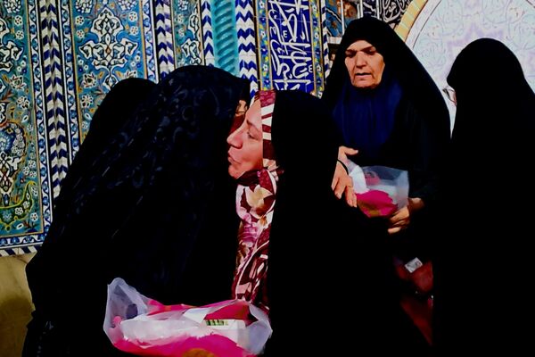 برگزاری محفل انس با قرآن و تجلیل از خانواده‌ شهدا