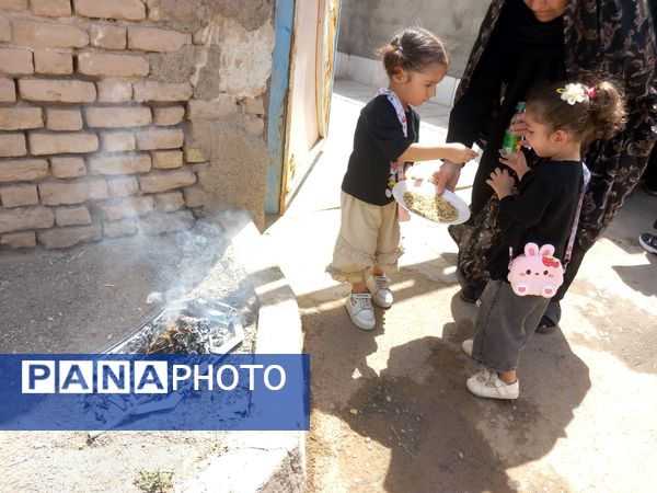 برگزاری تاسوعا حسینی در روستای بزنجرد