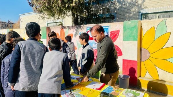 برگزاری نمایشگاه کتاب در دبستان معلم آشخانه 