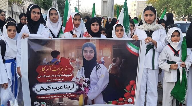 دختران تکواندوکار میناب بر مزار شهیده ارینا عرب‌کیش حاضر شدند