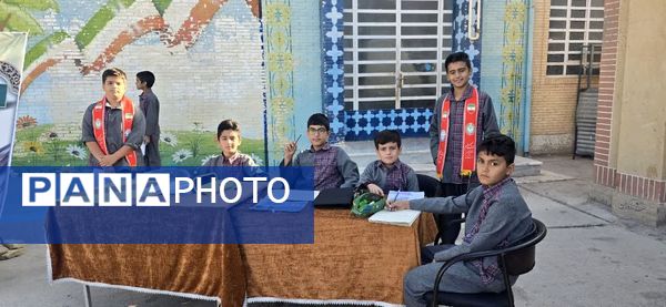 مراسم نمادین نواختن زنگ پدافند غیرعامل در دبستان شهید دهستانی بافق