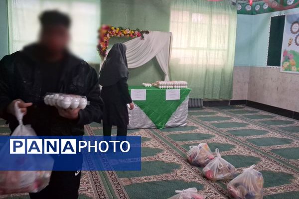توزیع بسته‌های معیشتی در مدرسه عمار نصیرشهر