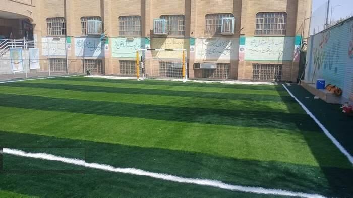 افتتاح زمین چمن مصنوعی دبیرستان شهید حاجی‌زاده در قم