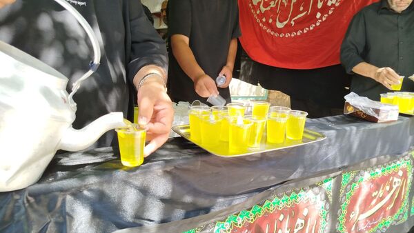 عزاداری ظهر  عاشورا در خیابان‌های شهر نیشابور 