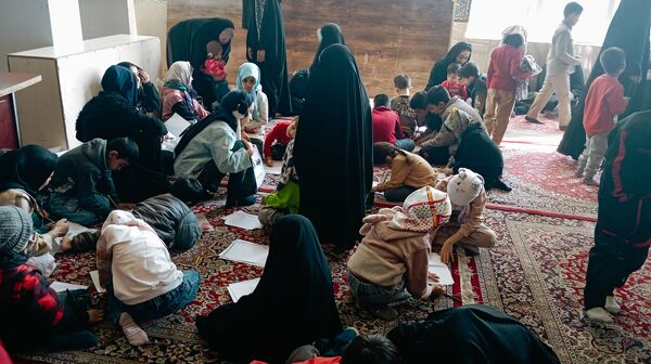 برپایی غرفه کودک در حاشیه نماز جمعه 