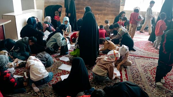 برپایی غرفه کودک در حاشیه نماز جمعه 