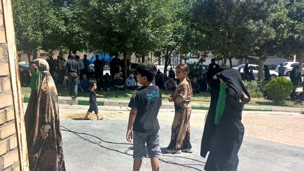 آیین سنتی «گل مالی» در روز عاشورا