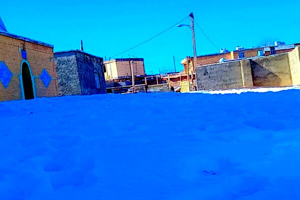 بارش باران و برف زمستانی در روستای کینک