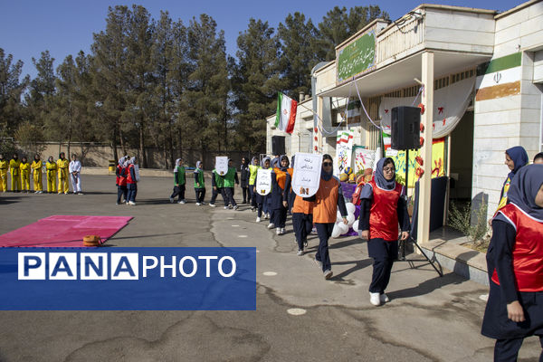 مشعل دوازدهمین دوره المپیادهای ورزشی درون مدرسه‌ای در شهر نیم‌ور روشن شد