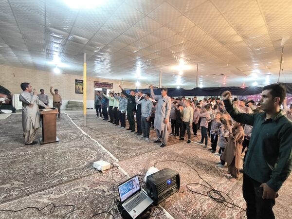 جشن آغاز سال تحصیلی و گرامیداشت هفته دفاع مقدس در حسینیه سیدالشهداء روستای مزرعه شهید بهشتی