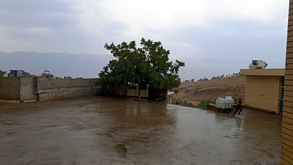 اولین بارش تابستانه در روستای کینک