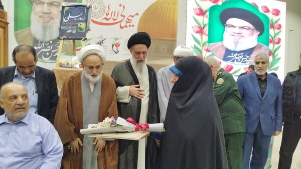 مراسم اولین سالگرد شهادت  سید حسن نصرالله، شهید حاج عباس نیلفروشان و سید هاشم صفی الدین در گلستان شهدا اصفهان 