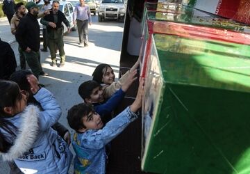 تشییع پیکرهای مطهر شهدای گمنام دفاع مقدس در کرمانشاه همزمان با سالروز شهادت حضرت زهرا (س)