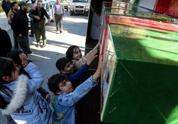 تشییع پیکرهای مطهر شهدای گمنام دفاع مقدس در کرمانشاه همزمان با سالروز شهادت حضرت زهرا (س)