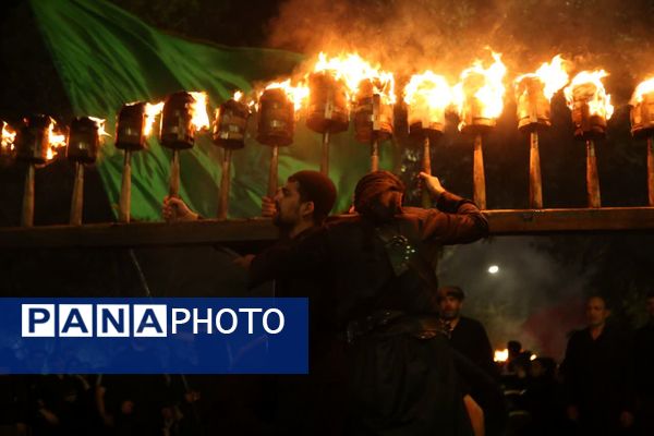 آیین «مشعل گردانی» نجفی‌های مقیم قم