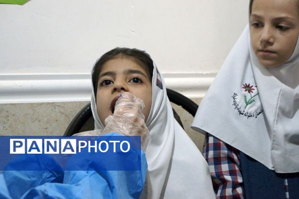 آموزش بهداشت دهان و دندان در مدرسه شهدای ۱۵ خرداد