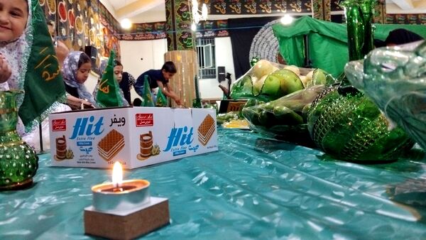 برپایی سفره حضرت‌رقیه (س) در شهر وردنجان