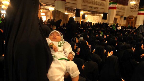 جلوه هایی از حضور مادران و نوزادان در همایشی به نام طفل شیرخوار کربلا