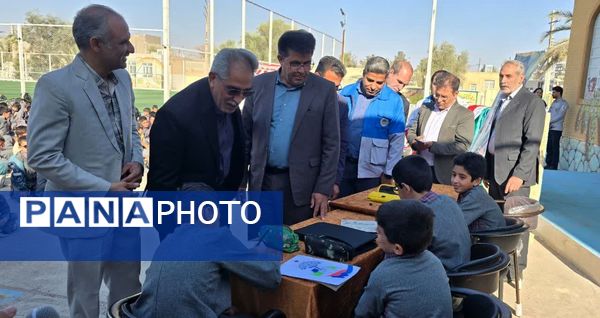 مراسم نمادین نواختن زنگ پدافند غیرعامل در دبستان شهید دهستانی بافق