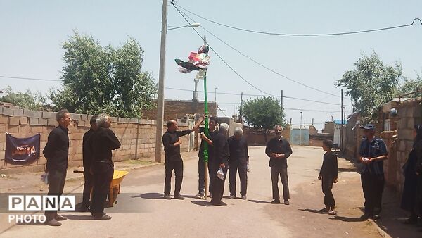 آیین سنتی علم گردانی روستای حسن آباد بلهر  در روز عاشورای حسینی 