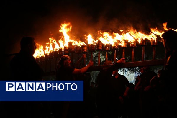 آیین «مشعل گردانی» نجفی‌های مقیم قم