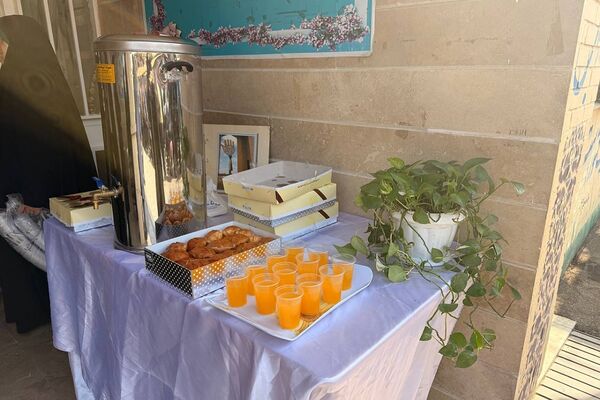 تقدیر از خانواده شهید خلبان علی بلورخانی در دبیرستان استعدادهای درخشان فرزانگان شهریار 