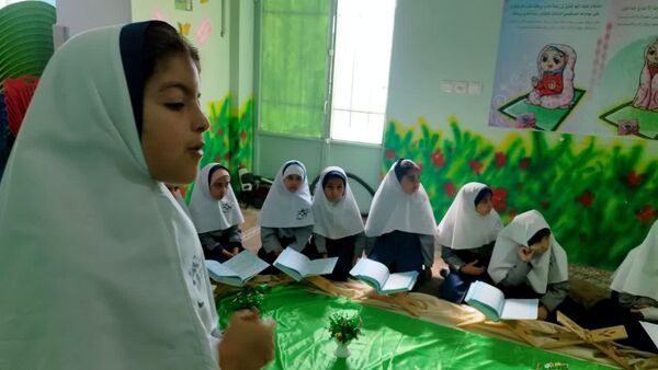 محفل انس با قرآن به‌مناسبت هفته بسیج دانش‌آموزی