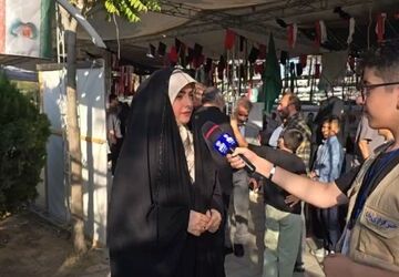 غبارروبی مزار مطهر شهدا به مناسبت هفته دفاع مقدس