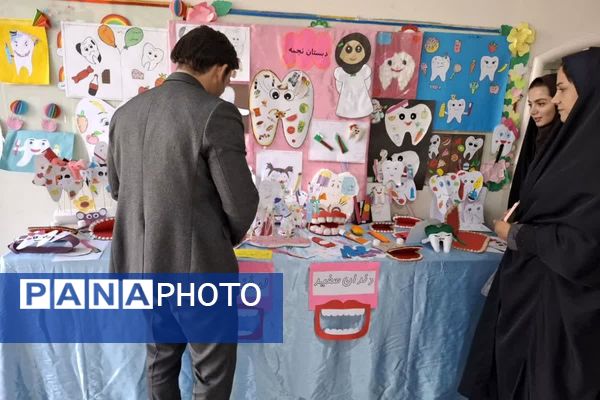 برگزاری طرح وارنیش فلوراید در مدرسه سمیه قرچک