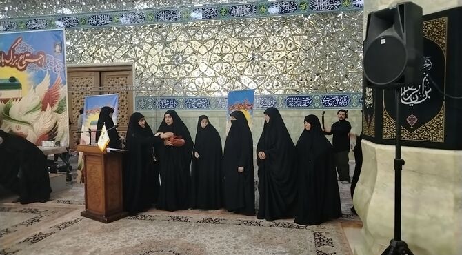 تقدیر از خانواده‌های شهدای افغانستانی جنگ رمضان در قم