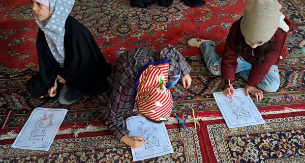 برپایی غرفه کودک در حاشیه نماز جمعه شهرستان کاشمر 