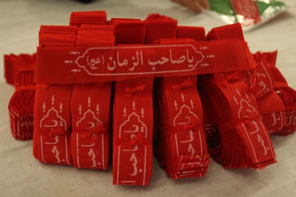 بسته‌بندی لباس همایش شیرخوارگان حسینی زنجان