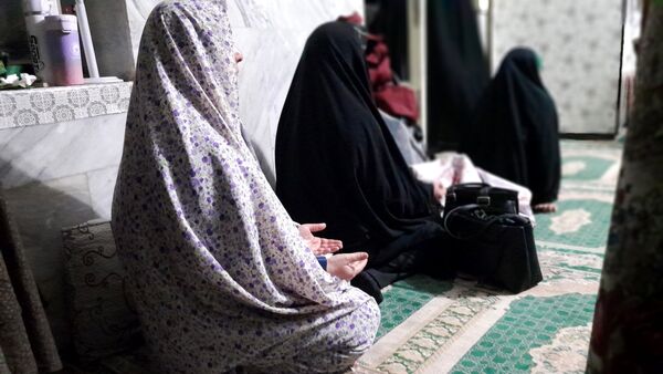 پرچم حرم حضرت عباس(ع) در مراسم اعتکاف شهرستان بن