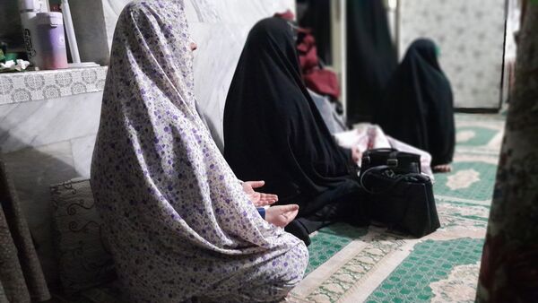 پرچم حرم حضرت عباس(ع) در مراسم اعتکاف شهرستان بن