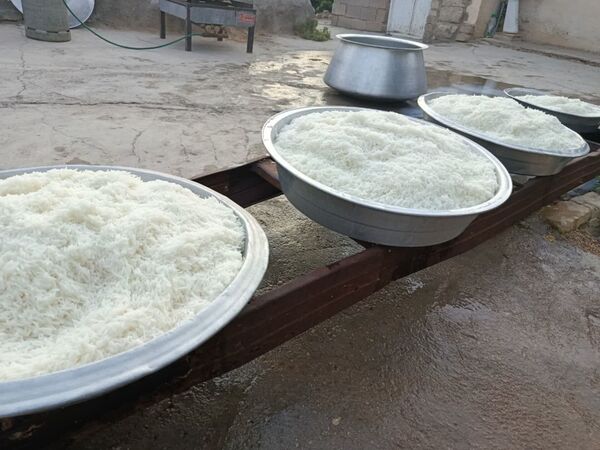 پخت و توزیع نذری در روز تاسوعای حسینی روستای حسن آباد داراب استان فارس